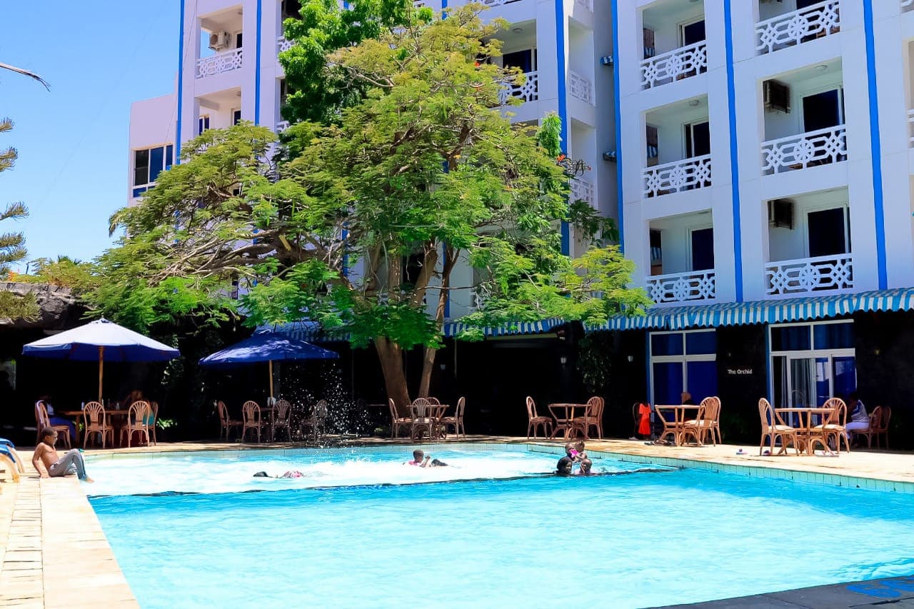 Sunrise Resort outdoor swimming pool with guests
