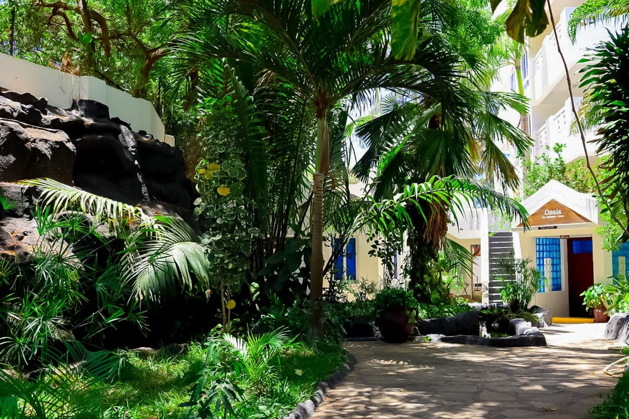 Sunrise Resort tropical grounds and facilities